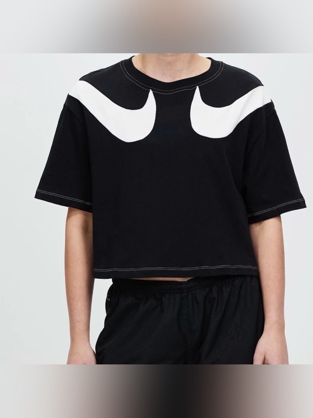 NWT Nike Black Cropped Graphic Tee with White Accent size S.